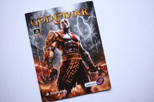 God of War: Tiene 18 Láminas (Álbum) (2011, Big-Bang)