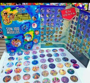 Caballeros del Zodiaco, Tazos Colección V°4 3D [Saint Seiya: Taps]: Coleccionador (2024, Megacolecciones)